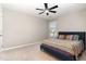 Cozy bedroom with a ceiling fan, a single window, and a comfortable bed at 4505 Wingate Song Ct, Knightdale, NC 27545