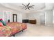 Large main bedroom with a crib and ample natural light at 4505 Wingate Song Ct, Knightdale, NC 27545