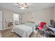 Cozy bedroom with modern flooring and ample workspace at 472 Shawnee Dr, Louisburg, NC 27549