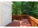 Wooden back deck with tree coverage providing lots of shade at 4802 Parkville Dr, Raleigh, NC 27604