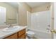 Full bathroom with a single sink vanity and tub and shower combination at 4802 Parkville Dr, Raleigh, NC 27604
