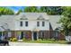 Charming townhome featuring brick and vinyl siding, well-maintained landscaping, and a welcoming entrance at 4802 Parkville Dr, Raleigh, NC 27604