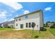 A 2 story home features an ample back yard and concrete patio at 517 Eagles Way, Mebane, NC 27302