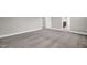 Spacious bedroom with carpet and a doorway to an adjacent room providing ease of access at 517 Eagles Way, Mebane, NC 27302