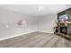 Spacious living room with stone fireplace and carpet at 517 Eagles Way, Mebane, NC 27302
