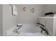 Relaxing bathroom with a soaking tub, neutral decor, and a serene ambiance at 5216 Marcella Ct, Durham, NC 27707