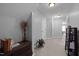 Hallway features neutral walls, plush carpet, and a view into a bedroom at 5216 Marcella Ct, Durham, NC 27707