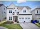 Charming two-story home with a well-manicured lawn and a two-car garage at 533 Kings Lake Way, Durham, NC 27703