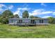Exterior view of the back of the home and large backyard at 64 Doughty Ln # E, Middlesex, NC 27557