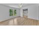 A bedroom features an en suite bathroom and natural light at 64 Doughty Ln # E, Middlesex, NC 27557