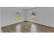 Bedroom featuring bright natural light and hardwood floors at 64 Doughty Ln # E, Middlesex, NC 27557