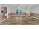 Bright dining area with hardwood style floors and a window overlooking the yard at 64 Doughty Ln # E, Middlesex, NC 27557