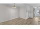 A naturally lit dining room features patterned tile flooring and white walls at 64 Doughty Ln # E, Middlesex, NC 27557
