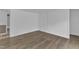 Room with lots of space featuring wood paneling and flooring at 64 Doughty Ln # E, Middlesex, NC 27557