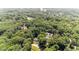 High aerial view of the property showing its secluded location surrounded by lush greenery at 6609 Electra Dr, Raleigh, NC 27607