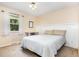 Bedroom featuring a queen bed, a window and a small shelf at 6609 Electra Dr, Raleigh, NC 27607