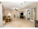 Spacious living room boasts a ceiling fan, television, and easy access to doorways at 6609 Electra Dr, Raleigh, NC 27607