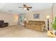 Comfortable living room features a plush sofa, soft lighting, and backyard access at 6609 Electra Dr, Raleigh, NC 27607
