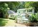 Lovely backyard with fenced in pool, deck, patio, and mature trees at 7216 Rabbit Run, Wake Forest, NC 27587