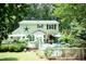 The backyard features a fenced pool, an entertainment area and lush landscaping at 7216 Rabbit Run, Wake Forest, NC 27587