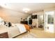 Cozy bedroom with neutral walls, adjoining bath and carpeted floor at 7216 Rabbit Run, Wake Forest, NC 27587