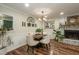 Cozy dining area featuring a stylish table, comfortable chairs, and decorative elements, creating a welcoming atmosphere at 7216 Rabbit Run, Wake Forest, NC 27587