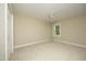 Bedroom with neutral walls, carpet, ceiling fan, and a side closet at 747 Weathergreen Dr, Raleigh, NC 27615