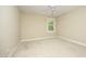 Bedroom with carpet, neutral colored walls, and natural lighting at 747 Weathergreen Dr, Raleigh, NC 27615