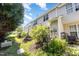 View of a landscaped backyard, showcasing the lush greenery and well-kept lawn at 7648 Winners Edge St, Raleigh, NC 27617