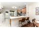 Modern kitchen with stainless steel appliances, white countertops, and ample cabinet space at 7648 Winners Edge St, Raleigh, NC 27617