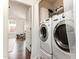 A laundry room featuring a washer and dryer at 7648 Winners Edge St, Raleigh, NC 27617