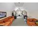 Finished attic with hardwood floors, bright natural light, sofa, and storage at 81106 Alexander, Chapel Hill, NC 27517