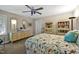 The cozy bedroom has a unique ceiling fan, an area for relaxing, and a spacious closet at 81106 Alexander, Chapel Hill, NC 27517