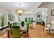 Spacious dining room with stylish decor, a fireplace, and ample seating at 81106 Alexander, Chapel Hill, NC 27517