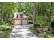 Charming two-story brick home with a two-car garage and a well-maintained yard at 81106 Alexander, Chapel Hill, NC 27517