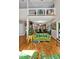 Living room view of open concept floorplan, hardwood floors, and second story overlook at 81106 Alexander, Chapel Hill, NC 27517