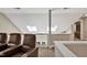Spacious loft area with theater seating, skylights, and a view of the outdoors at 81106 Alexander, Chapel Hill, NC 27517
