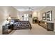 Spacious main bedroom featuring an ensuite and neutral walls, creating a soothing retreat within the home at 81106 Alexander, Chapel Hill, NC 27517
