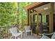 Relaxing screened porch offering a peaceful outdoor retreat with views of the landscaped backyard and mature trees at 81106 Alexander, Chapel Hill, NC 27517