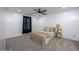 Bright bedroom with carpet floors, a large window, and neutral decor at 82 Mamie Rd, Benson, NC 27504