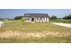 Charming single-story home with well-maintained lawn and landscaping at 82 Mamie Rd, Benson, NC 27504