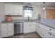 Updated kitchen with granite countertops, stainless steel appliances, and custom cabinetry at 82 Mamie Rd, Benson, NC 27504