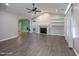 Spacious living room featuring a fireplace, vaulted ceilings, and hardwood floors at 82 Mamie Rd, Benson, NC 27504