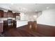Modern kitchen featuring stainless steel appliances, granite countertops, and a center island at 835 New Derby Ln, Apex, NC 27523
