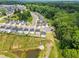 Picturesque aerial view of a neighborhood with modern homes and extensive green space at 84 Elliot Dr Dr, Clayton, NC 27520