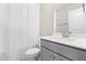 Bathroom featuring a modern vanity, neutral decor, and a shower with a curtain at 84 Elliot Dr Dr, Clayton, NC 27520