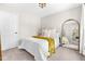 Cozy bedroom featuring neutral tones, a comfortable bed, and a decorative gold mirror at 84 Elliot Dr Dr, Clayton, NC 27520