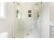 Luxurious shower featuring elegant marble tiling, a glass enclosure, and contemporary fixtures that create a spa-like experience at 84 Elliot Dr Dr, Clayton, NC 27520