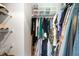 Organized walk-in closet with clothing racks and storage bins for optimal storage solutions at 84 Elliot Dr Dr, Clayton, NC 27520