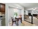 Bright breakfast nook with a table, two chairs, and natural light by the window at 1 Saturn Court Ct, Durham, NC 27703